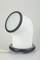 L'Art presents: 
Holmegaard, 
Denmark
Table lamp in 
opaline white 
glass with 
black details.