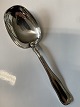 Antik Huset 
presents: 
Serving 
spoon in double 
fluted sterling 
silver by Georg 
Jensen.
Length 20.3 
cm.