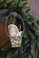 K&Co. presents: 
Old 
Christmas tree 
ornament in the 
shape of a 
small braided 
basket in brass 
from around 
1950...