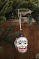 K&Co. presents: 
Old 
Christmas tree 
ornament in the 
shape of a 
clown's head in 
painted glass 
from 1930. H: 
6cm.