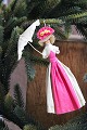 K&Co. presents: 
Old 
Christmas tree 
ornament, nice 
lady with 
umbrella made 
of colored 
crepe paper...