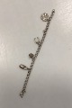 Bismarck 
bracelet with 
various 
pendants