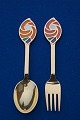 Antikkram 
presents: 
Michelsen 
set Christmas 
spoon and fork 
1971 of Danish 
gilt sterling 
silver