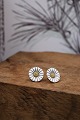 K&Co. presents: 
A pair of 
old Georg 
Jensen 
Marguerite / 
Daisy earrings 
with ear studs 
in sterling 
silver and ...