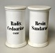 Pair of 
porcelain 
apothecary jars 
with lids, 19th 
century.