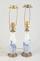 L'Art presents: Pair of small table lamps in porcelain and brass, early 20th century.