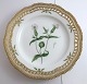 Lundin Antique 
presents: 
Royal 
Copenhagen. 
Flora Danica 
plate w. 
open-work 
border. 
Diameter 25 cm. 
Model 3553. ...