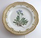 Lundin Antique 
presents: 
Royal 
Copenhagen. 
Flora Danica 
plate w. 
open-work 
border. 
Diameter 25 cm. 
Model 3553. ...