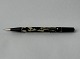 Reutemann Antik 
presents: 
10-sided 
cream and Black 
marbled 
Eversharp 
pencil