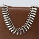 Antik 
Damgaard-
Lauritsen 
presents: 
Bent 
Gabrielsen, 
Georg Jensen; A 
necklace of 
sterling 
silver, nr. 115
