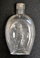 Pegasus – Kunst - Antik - Design presents: German flask in clear glass with motif of Germania, 19th century.