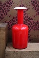 K&Co. presents: Old red glass vase from Holmegaard designed by Otto Brauer. H: 30cm...
