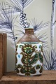 K&Co. presents: Royal Copenhagen, Baca faience vase with fine glaze, designed by Nils Thorsson...