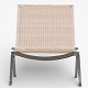 Roxy Klassik presents: Poul Kjærholm / E. Kold Christensen.PK 22 - Armchair in newly woven cane with steel ...