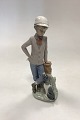 Danam Antik presents: DAO/Lladro Porcelain figurine of Boy with Dog