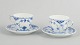 L'Art presents: Royal Copenhagen Blue Fluted Half Lace, set of two coffee cups with matching saucers.