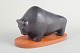 L'Art presents: Lillemor Petersson for Rörstrand, bull figure on wooden stand.