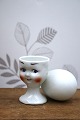 Old egg cup from the 1930s in porcelain with a painted ...