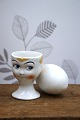 Old egg cup from the 1930s in porcelain with a painted ...
