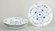 Royal Copenhagen Blue Fluted Plain, set of four dinner plates.