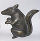 Figure of a squirrel in bronze.