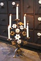 K&Co. presents: French 19th century church candlestick decorated with 2 old white porcelain flowers, 3 white ...