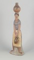 L'Art presents: Lladró figurine, woman with vessels.