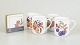 L'Art presents: Royal Worcester Evesham, set of four mugs and set of six coasters.