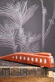 K&Co. presents: Decorative, old vintage train "DSB - Vestjyden" in wood painted in reddish brown with a nice ...