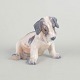 L'Art presents: Dahl Jensen, porcelain dog figurine.
