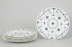 L'Art presents: Set of seven dinner plates in blue fluted style by Churchill Staffordshire.