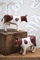 K&Co. presents: Decorative, old dairy cow in carved wood with fine original painting, ears and tail in leather...