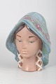 L'Art presents: Lladró hand-painted ceramic sculpture, female bust with veil.