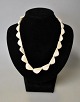 Pegasus – Kunst - Antik - Design presents: Greenlandic walrus necklace, 20th century.