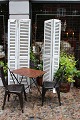 K&Co. presents: A pair of decorative old French shutters with original light grey patinated colour with slats...