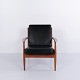Model 118 armchair by Grete Jalk for France & Søn in teak and black leather from the 1960s