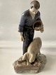 Antik Huset presents: Bing & Grondahl figurine Farmer with pig,No. 2263