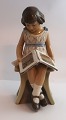Lundin Antique presents: Dahl Jensen. Porcelain figurine. Girl with book. Model # 1107. Height 22 cm. (2 quality)