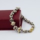 Antik Damgaard-Lauritsen presents: Peter Rauff; Bracelet in sterling silver and 18k gold