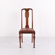 Dining chairs in dark wood and red leather from the 1920s