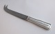 Lundin Antique presents: Georg Jensen. Sterling silver. Old danish. Cheese knife with steel blade. Length 18.5 cm.
