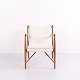 Osted Antik & Design presents: Finn Juhl Walnut Lounge Chair with Light Fabric from 1952