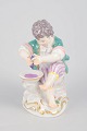 L'Art presents: Meissen, boy with grape press figurine.
