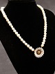 Middelfart Antik presents: Pearl necklace with A Michelsen daisy brooch