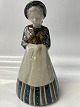 Antik Huset presents: B&G Stoneware figurine - Woman in traditional costume. No. 7205/10.Height 24 cm.