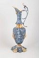L'Art presents: Baroque style bronze wine pitcher.
