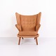 Osted Antik & Design presents: Hans J. Wegner AP19 Papa Bear Chair in Cognac-Coloured Nubuck Leather by AP Stolen