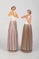Two figures by Cay Cedergren.