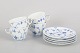 L'Art presents: Royal Copenhagen Blue Fluted Plain, set of four coffee cups with matching saucers.