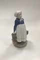 Danam Antik presents: Royal Copenhagen Figurine Peasant girl with lunch No. 815